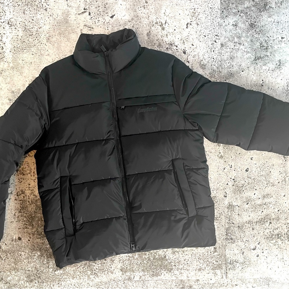INVICTA black puffer jacket.